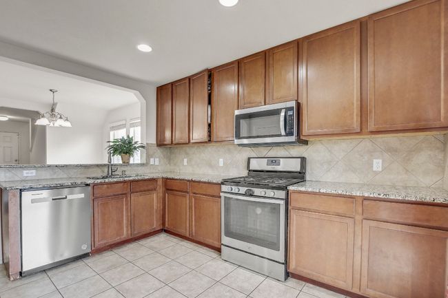 Granite counters, recessed lights | Image 5