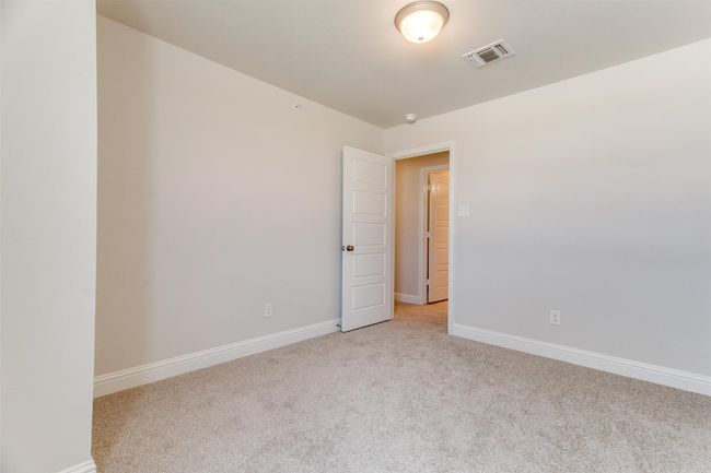 Spare room with light carpet | Image 29