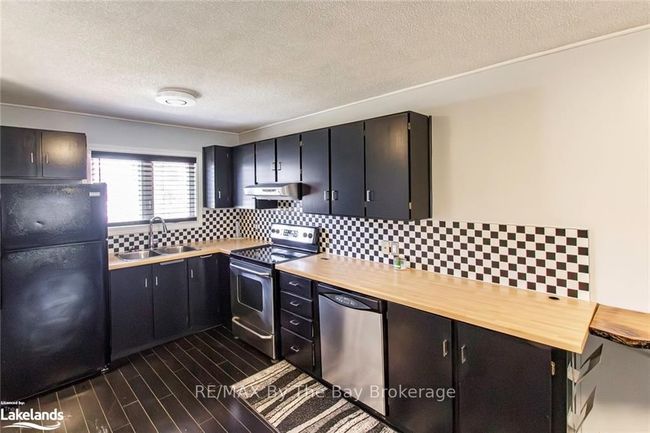 8 - 39 28th St S, Condo with 3 bedrooms, 2 bathrooms and 1 parking in Wasaga Beach ON | Image 6