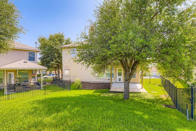 Fenced backyard featuring a patio | Image 29