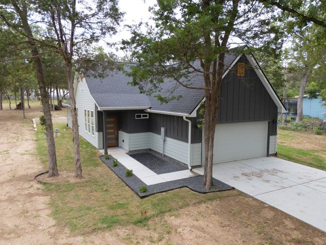 A breathtaking aerial view of a stunning home, beautifully positioned on nearly an acre—an incredible opportunity to make it yours! | Image 36