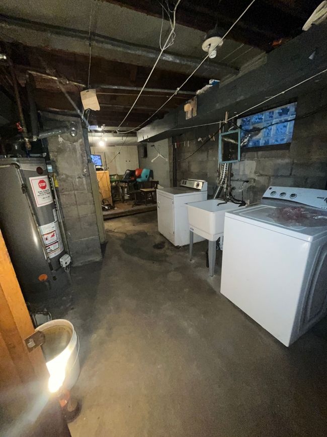 Laundry room view toward lavatory / security area | Image 26