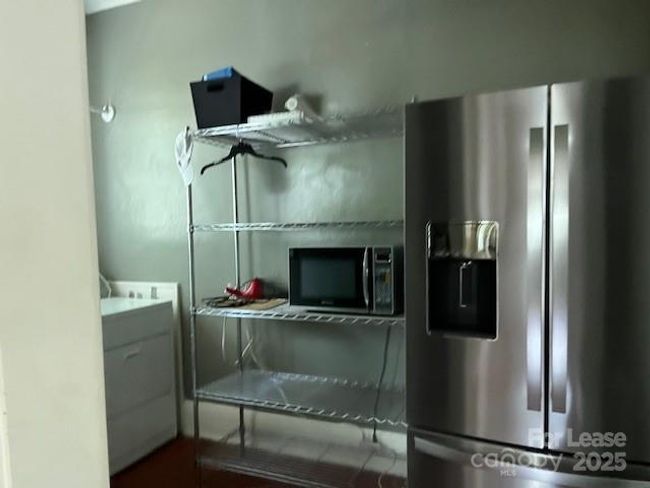Refrigerator/Laundry room off kitchen | Image 5