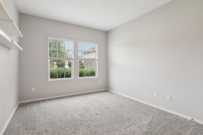 Bedroom 2 at the front of the home. | Image 18