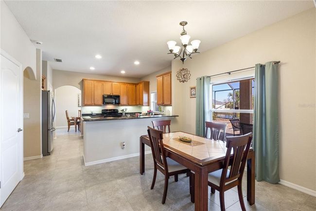 14462 Fort Worth Cir, House other with 4 bedrooms, 3 bathrooms and null parking in PORT CHARLOTTE FL | Image 5