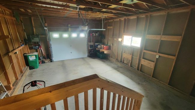Oversized one car attached garage with newer window and garage door | Image 22