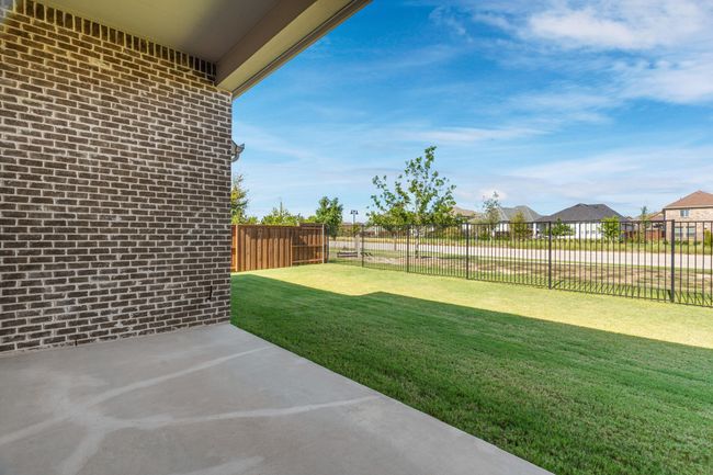 View of yard with a patio area and a residential view | Image 36