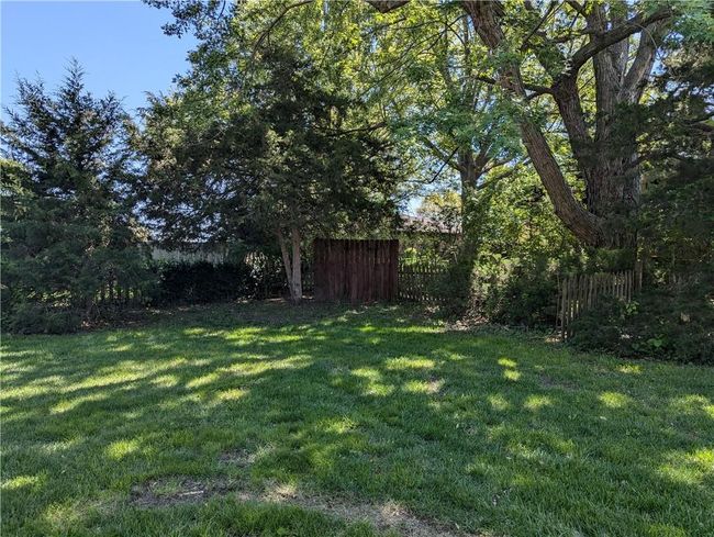 View of yard featuring fence | Image 11