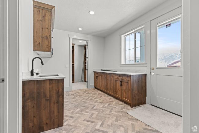 Kitchen featuring recessed lighting and light countertops | Image 19