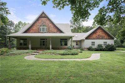 View of front of property featuring a front yard and covered porch | Image 2