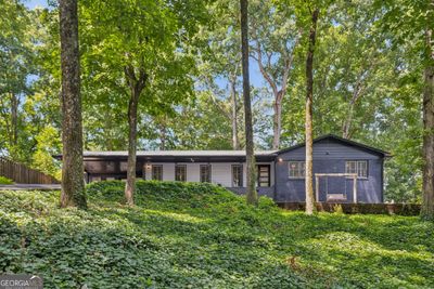 6878 Brandon Mill Road, House other with 4 bedrooms, 3 bathrooms and null parking in Sandy Springs GA | Image 1