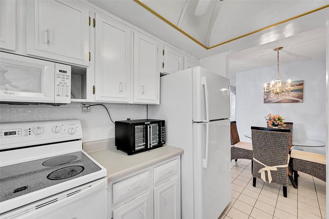 Being Sold Furnished, Turn-Key, Refrigerator, Stove, Microwave, Toaster Oven, Dishwasher (owner never used, not sure of condition). Balcony Access from your Kitchen and Perfect Dining Area Included. | Image 37