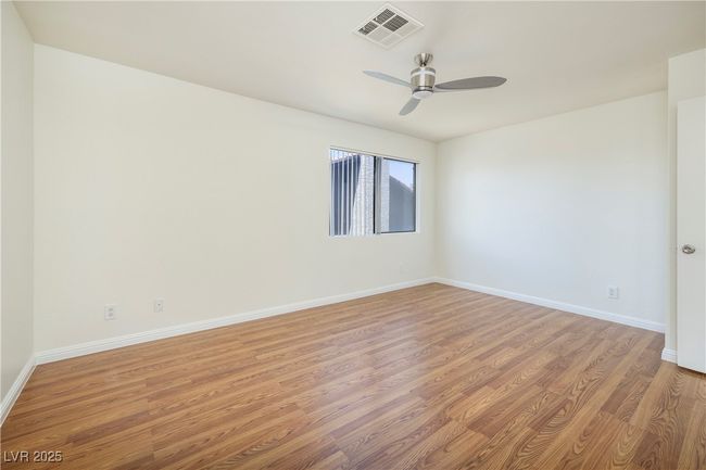 Unfurnished room featuring ceiling fan and light wood-type flooring | Image 15