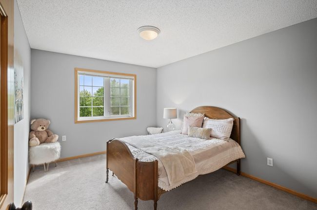 2nd bedroom on the upper level overlooks the front yard. | Image 24