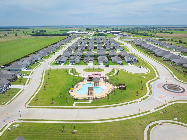 Aerial perspective of suburban area featuring a pool area | Image 36