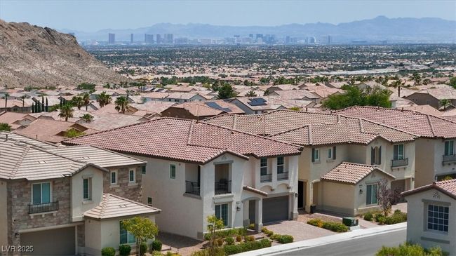 View of mountain background featuring nearby suburban area | Image 63