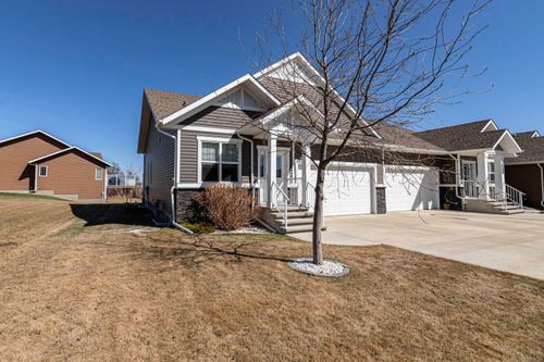 4920 Beardsley Avenue, Home with 4 bedrooms, 3 bathrooms and 2 parking in Lacombe AB | Card Image