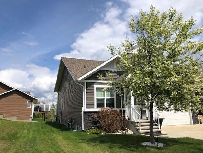 4920 Beardsley Avenue, Home with 4 bedrooms, 3 bathrooms and 2 parking in Lacombe AB | Image 1
