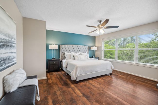 Primary bedroom with a view of the amazing back yard! | Image 40