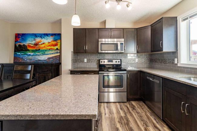 144 Sunvalley Road, Townhouse with 3 bedrooms, 4 bathrooms and 2 parking in Cochrane AB | Image 13