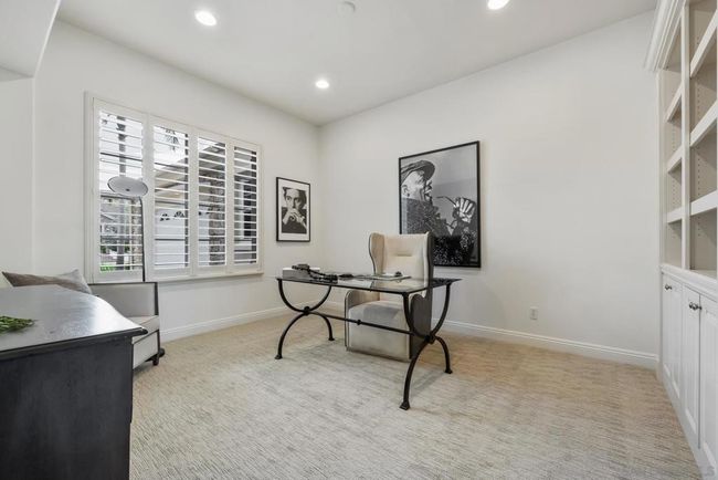 Bonus room that can be used as an office with built-in shelving | Image 22