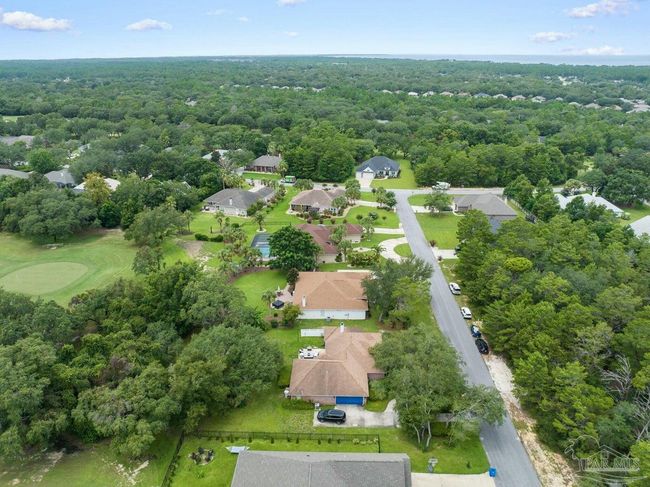7008 Turnberry Cir, House other with 4 bedrooms, 2 bathrooms and 3 parking in Navarre FL | Image 67