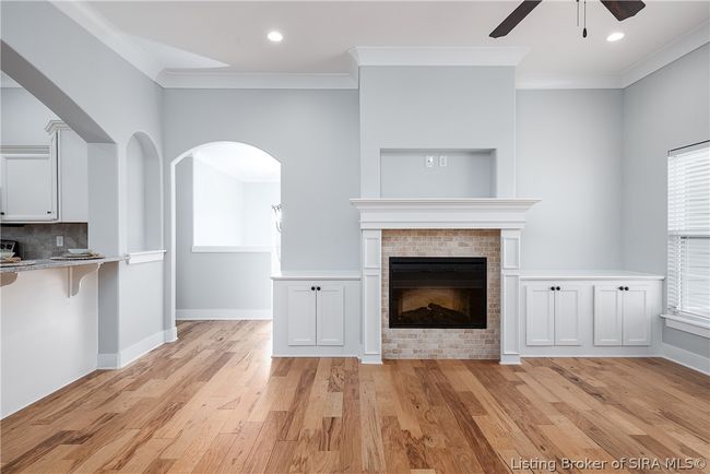 The Archways, Art niches, Built in cabinetry, and beautiful Trim Work are all details that add to the beauty of this home! | Image 7