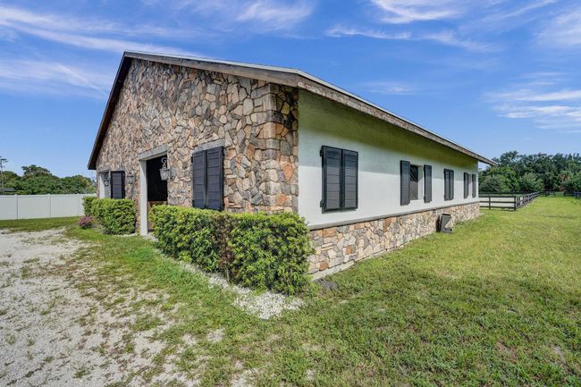 502 Rambling Drive Cir, House other with 5 bedrooms, 3 bathrooms and null parking in Wellington FL | Image 39