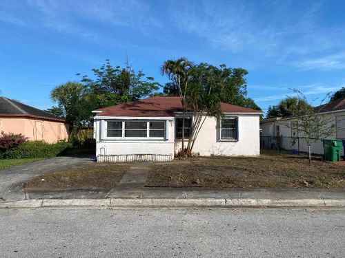 756 W 1st St, Riviera Beach, FL, 33404-7606 | Card Image