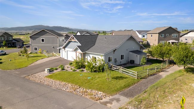 Aerial view of residential area featuring a mountainous background | Image 41