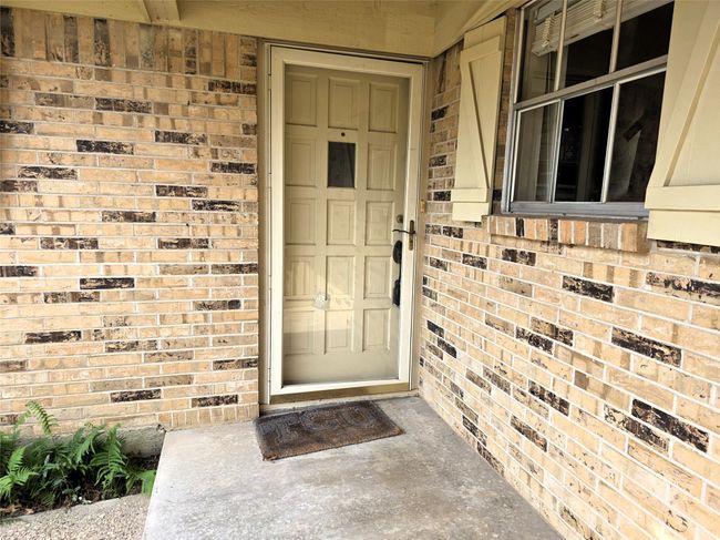 Entrance to property with brick siding | Image 5