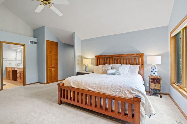 The primary suite includes vaulted ceiling, walk-in closet, and large bathroom. | Image 21