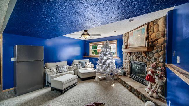 lower level with fireplace | Image 15