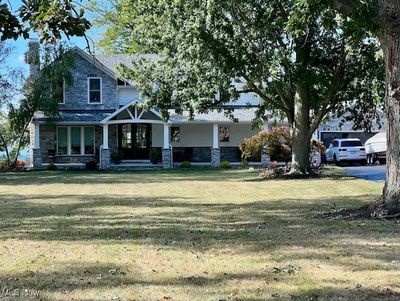 View showing large covered porch | Image 1