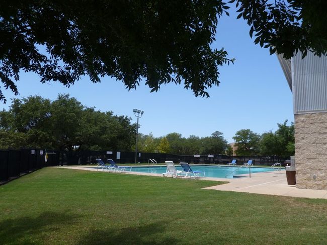 Community pool featuring a patio | Image 40