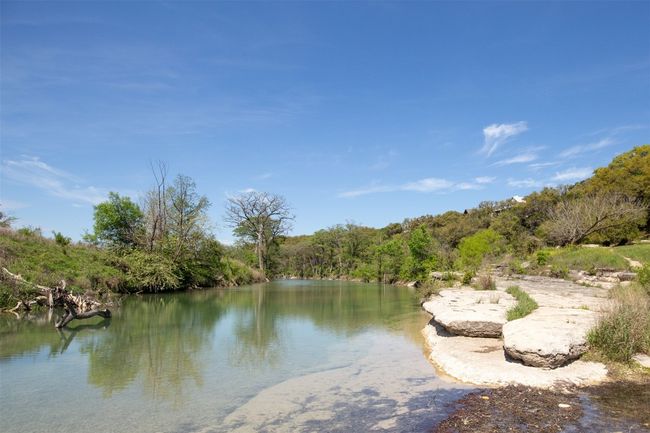 Relax by the river's edge in the 6+ acre river park. | Image 6