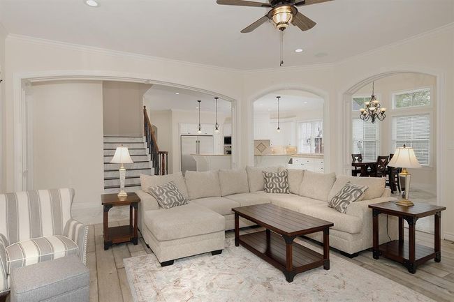 A 2nd staircase is featured in this photo off the family room and kitchen | Image 17