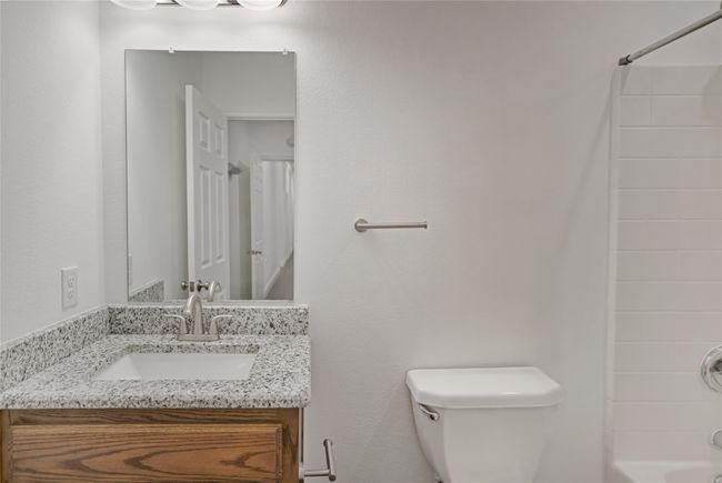 Full bath featuring vanity and shower / bath combination | Image 27