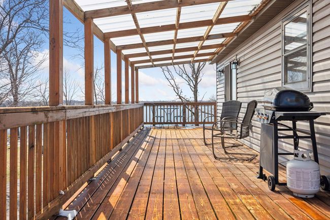 Fire up the grill and enjoy outdoor dining with the serene backdrop of Roberds Lake. | Image 24