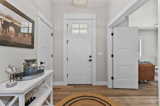 Foyer with wood finished floors and baseboards | Image 5