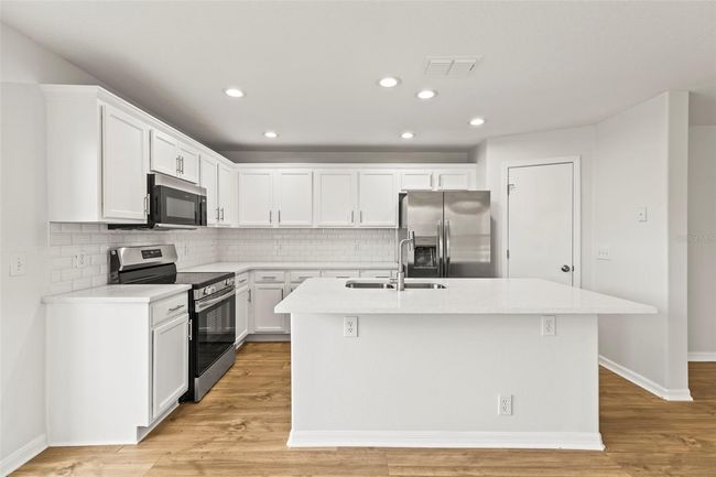 2032 Sunset Meadow Dr, Townhouse with 4 bedrooms, 3 bathrooms and null parking in CLEARWATER FL | Image 6