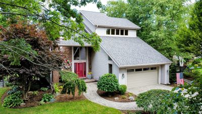 Front, curb side view of house. | Image 1