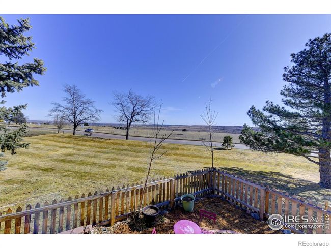 Fenced yard with fountain | Image 30