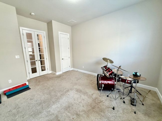 Office area with french doors, carpet floors, and baseboards | Image 23