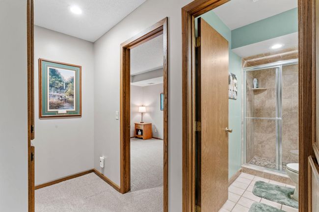 2 bedrooms and a bathroom located in the lower level | Image 42