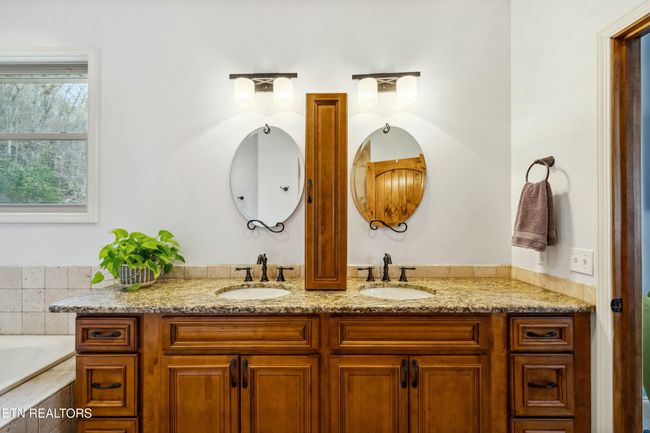 Double sinks and plenty of storage. | Image 28