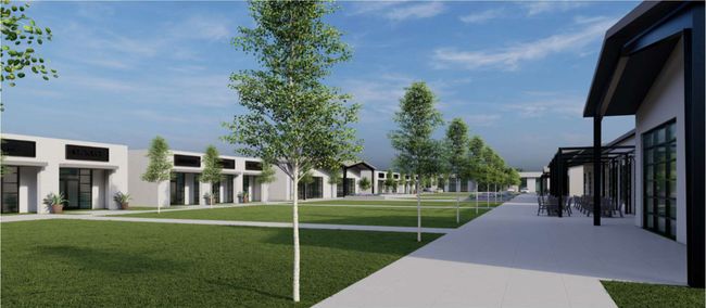 Surrounding community with a lawn and an area to practice putting | Image 5