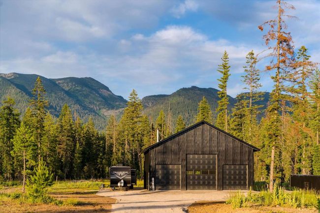 View of mountain background with a heavily wooded area | Image 4