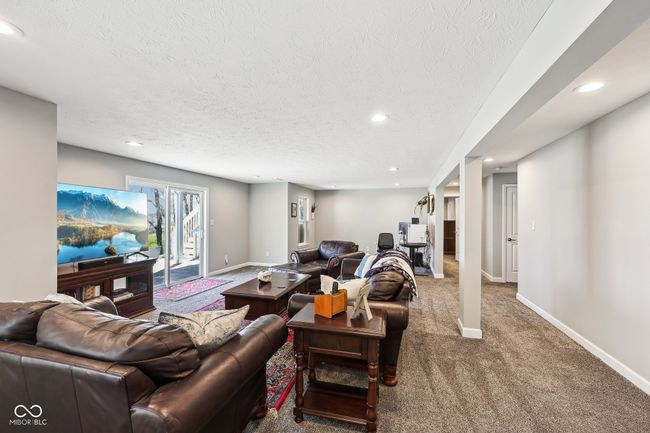 Walk out basement has plenty of room for movies & recreation. | Image 52