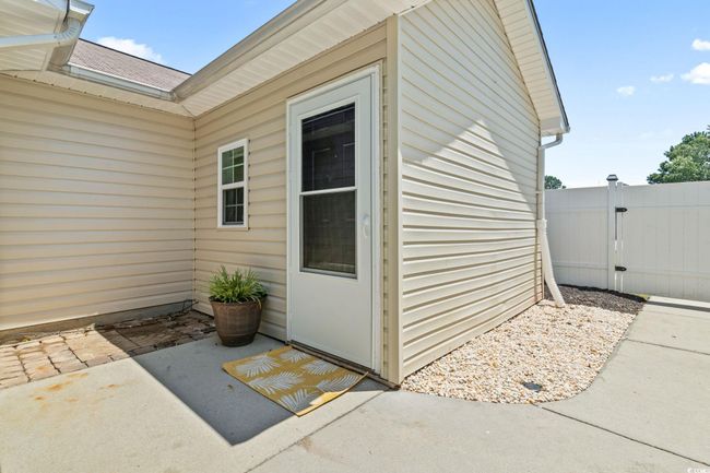 Property entrance with a patio and a gate | Image 27